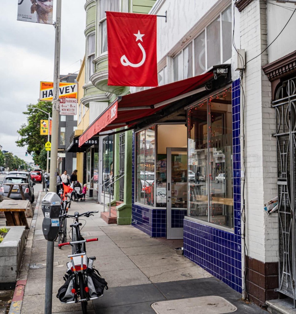 Ritual Coffee storefront with red flag