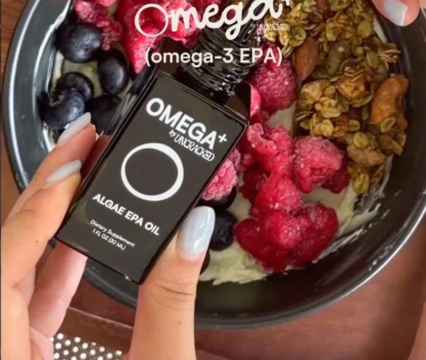 Omega+ algae EPA oil over an acai bowl